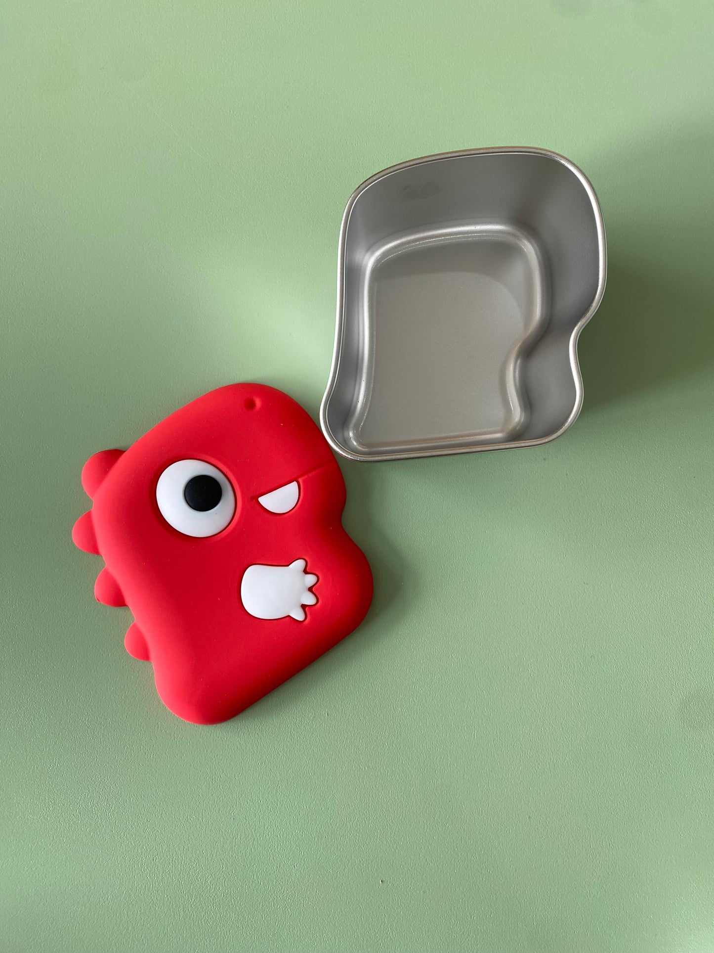 Contenedor acero inoxidable forma de dinosaurio