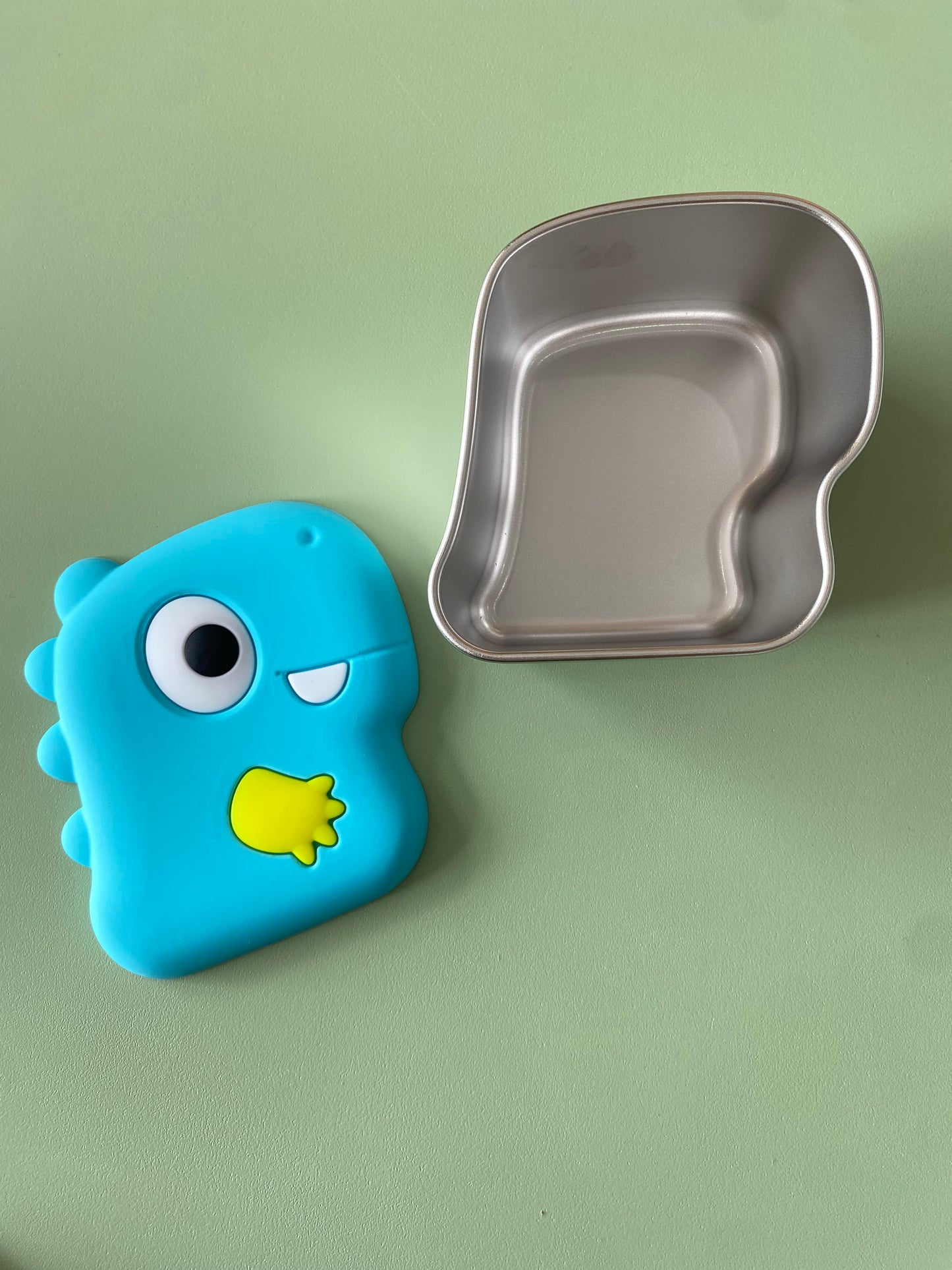 Contenedor acero inoxidable forma de dinosaurio